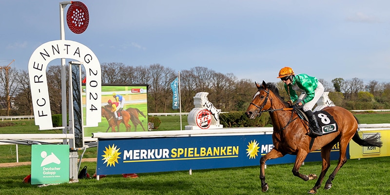 Merkur Casinos NRW galoppieren beim Pferderennen in Köln